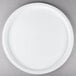 A white plate with a hole in the center.
