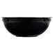 A close-up of a black Fineline high profile catering bowl with a white background.