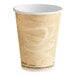 A Solo paper hot cup with a white lid.