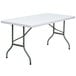 A Flash Furniture white rectangular table with metal legs.