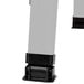 The silver metal legs of an Aarco aluminum A-Frame sign board on a white background.