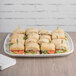 a close up of a sandwich with toothpicks