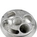 a metal container with holes