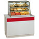 A Federal Industries CH3628 Signature Series heated countertop display case full of food.