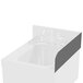 A white sink with a black right side splash guard.
