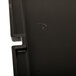 A black plastic panel with a circle in the middle.