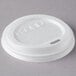 A white Eco-Products compostable plastic hot cup lid with text on it.