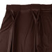 a brown skirt with pleats