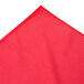 a red cloth with a stitched edge