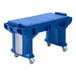 A blue plastic Cambro Versa work table on heavy duty casters.