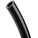 A close-up of a black plastic tube.