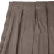 A gray Snap Drape box pleat table skirt with velcro clips.