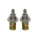 A pair of silver metal Advance Tabco faucet valves.