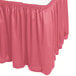 A dusty rose Snap Drape shirred pleat table skirt with Velcro clips.