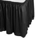 a black table skirt with a white surface