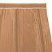 A brown table skirt with a white box pleat.