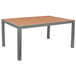 A BFM Seating Longport rectangular table with a synthetic teak wood top and aluminum legs.