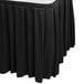 a black table skirt with a white surface