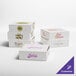 A white customizable pie box with yellow and purple labels.