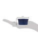 A hand holding a blue CAC Festiware fluted ramekin.