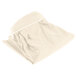 A rolled-up white Snap Drape Wyndham table skirt with a white band.