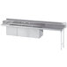 An Advance Tabco stainless steel dishtable with three compartment sink and right drainboard.