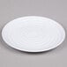 A white GET Milano melamine plate with a spiral pattern.