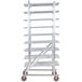 A white metal Winholt can rack with several shelves on red wheels.