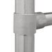 A close-up of a stainless steel Advance Tabco two compartment sink pipe with a handle.