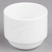A white Libbey porcelain bouillon cup with a small handle on a gray surface.