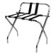 A chrome metal CSL luggage rack with black straps.