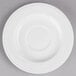 A white Libbey porcelain tea saucer with a circular rim.