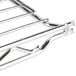 A Metro chrome wire shelf with metal bars.