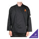 A man wearing a black Chef Revival long sleeve chef jacket with a logo on the counter.