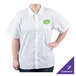 A woman wearing a white Chef Revival cook shirt with a green logo.