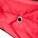 A close up of a red and black Rubbermaid ProServe insulated pizza delivery bag with a zipper.