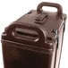 A brown plastic container with handles.