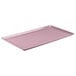 A pink rectangular Cambro dietary tray.