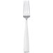 A silver Bon Chef dinner fork with a white handle.