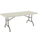 A white rectangular Lifetime folding table with metal legs.