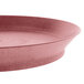 A pink polypropylene deli server with a short base.
