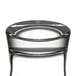 A close up of a Libbey highball glass on a table with a metal ring inside