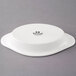 a white bowl with black text