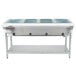 An Eagle Group open well stainless steel hot food table with four trays.