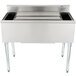 a stainless steel sink with four compartments