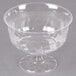 a clear glass bowl with a small base