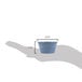 A hand holding a blue container with a blueberry ramekin inside.