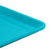 A close up of a blue Cambro dietary tray.