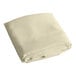 A folded ivory rectangular cloth table cover on a white background.