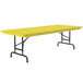 A yellow rectangular Correll folding table with black legs.